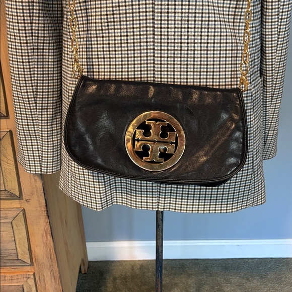 Tory Burch Handbags - Tory Burch Reva Logo Clutch Black
Leather Gold Chain crossbody convertible bag